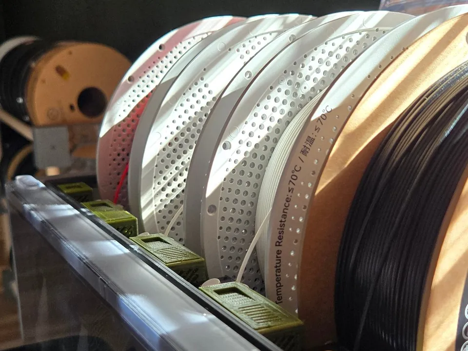 Filament spools loaded in the printer’s automatic material system